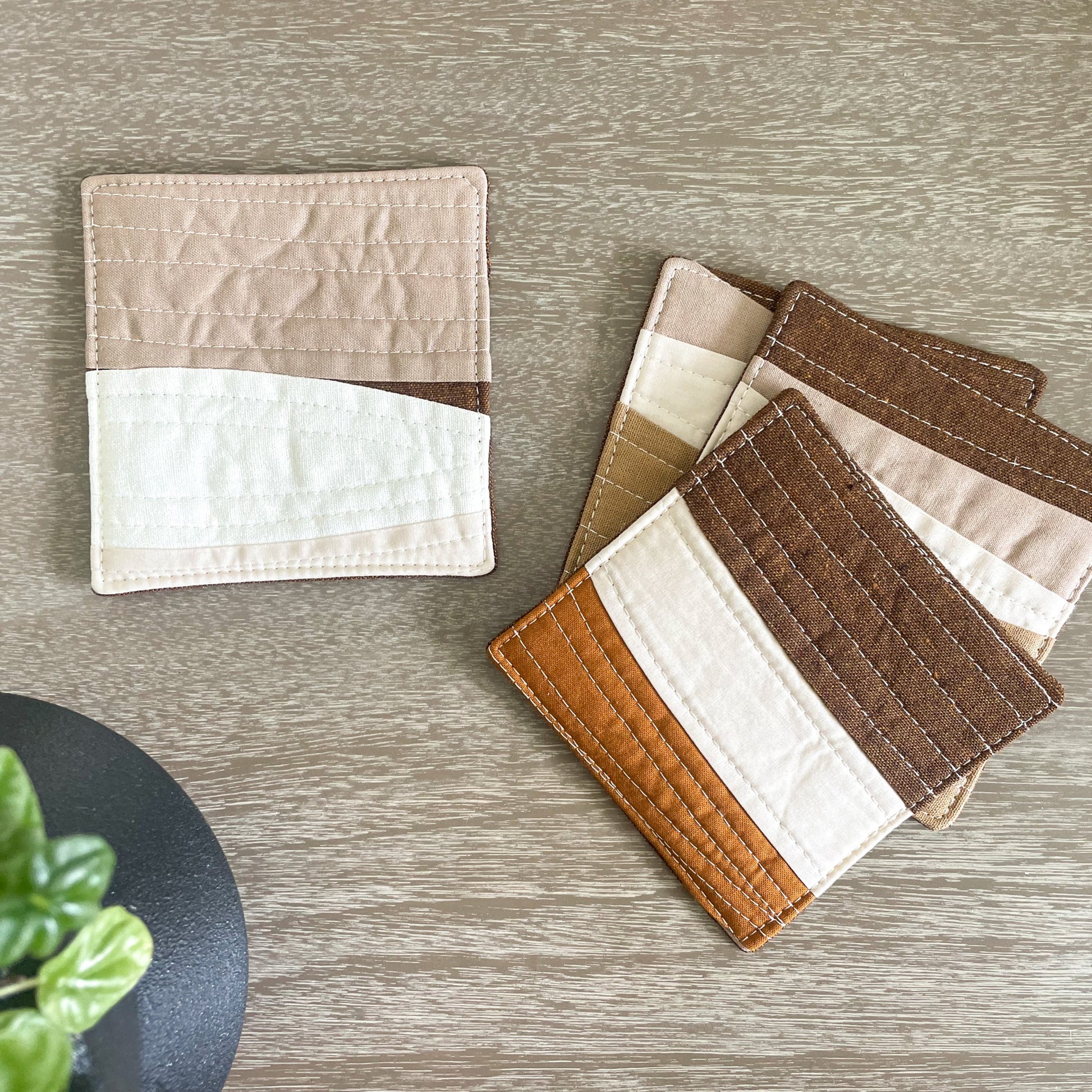 quilted coasters_rust and natural set of 4 at angle